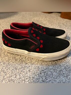 Vans Black Slip-On Sneakers with Red Heart Details